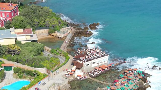 private beaches, resort atmosphere on the rocky shores of Castiglioncello, Italy, long time coastal enclave for true Italian style relaxation