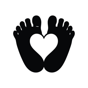Silhouette of feet forming a heart shape