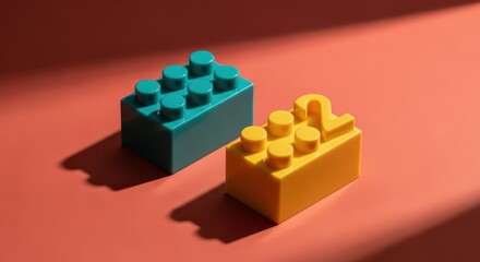 Fototapeta premium Teal and Yellow Plastic Building Blocks with Number Two on Red Background with Long Shadow