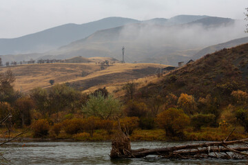 Autumn landscape of river in the Caucasus mountains of Georgia © Pavel