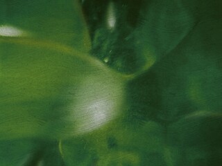 Fototapeta premium Abstract Emerald Glass Refraction and Concrete Swirl Pattern for Industrial Wellness Branding