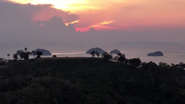 Fly sideways, view of viewpoint hill on Koh Samu at sunset
