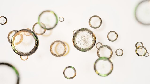 明るい背景に浮かぶシャンパンゴールドの透明な泡と水滴の3D抽象デザイン / 3D abstract design of champagne gold transparent bubbles and water droplets floating on bright background