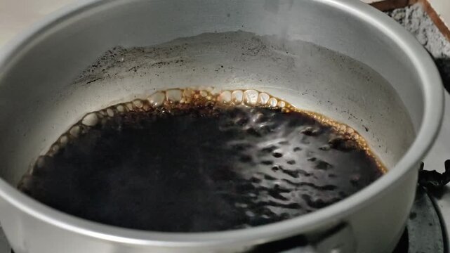 Coffee brewed and heated on the stove