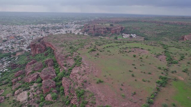 Panoramic view of Badami Caves with surrounding terrain and urban landscape