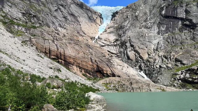 Briksdalsbreen glacier with a beautiful turquoise lake