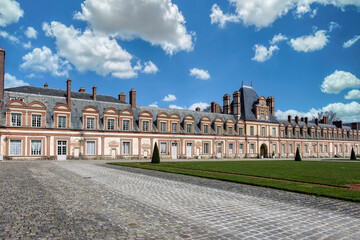 Fototapeta premium The Palace of Fontainebleau, in French Château de Fontainebleau, is one of the largest French royal palaces. It is located in the town of Fontainebleau, in the Seine-et-Marne department.