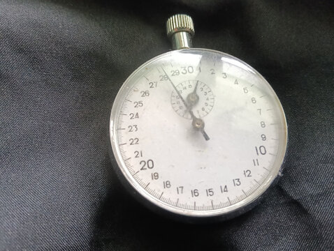Stopwatch on a black background. Close-up of a traditional mechanical stopwatch.photo taken in malaysia