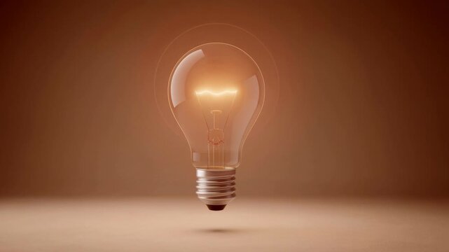 Glowing light bulb floating with warm glow on brown background representing innovation and creativity