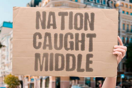 "Nation Caught Middle" Nations trapped between rival superpowers absorb the costs of their competition. NATIONS. RIVAL. SUPERPOWERS. ABSORB. COMPETITION.