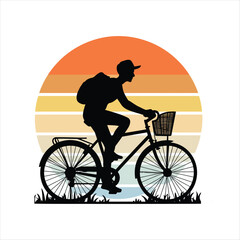 Obraz premium Silhouette of man with cap riding bicycle at sunset