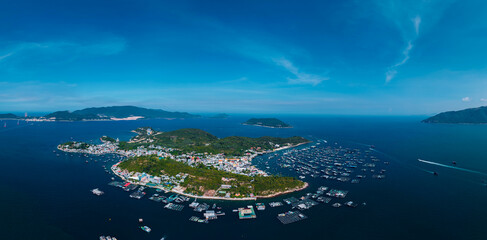 Aerial view of island town and extensive floating fish farms Nha Trang Vietnam © Parilov