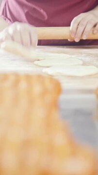 Cook is baking in the bakery