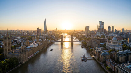 Fototapeta premium Panoramic aerial view of London skyline at sunrise with the River Thames and Tower Bridge.
