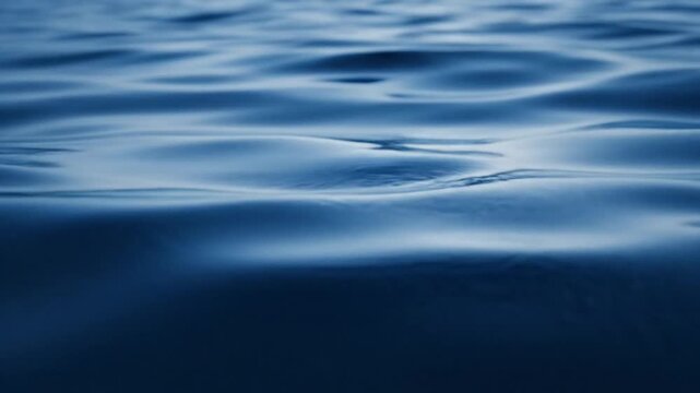 Super Slow Motion Water Surface Waves at 1000 FPS with Light Reflections, Abstract Blue Liquid Texture Background, Hypnotic Ripple Motion, Clean Minimal Design Element, 4K Loopable Video
