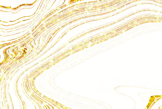 Golden liquid waves with shimmering particles during luxury event celebration