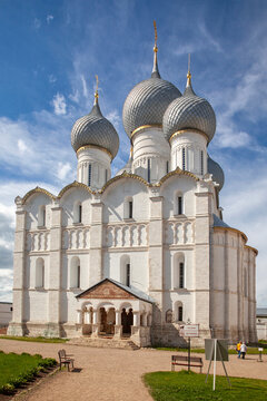 Ancient Russian cathedral stands tall under bright blue sky