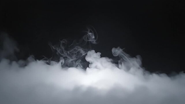 Dense layer of white smoke or thick fog rolling at the bottom of a black frame, showing heavy vapor texture, realistic wispy swirls, and atmospheric dry ice effects for compositing.