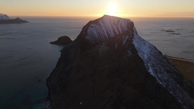 Sunrise over mountains and ocean in Norway highlighting nature&rsquo;s beauty and colors