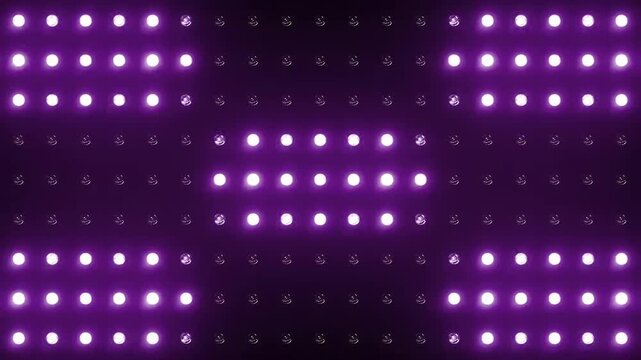 Abstract stage lighting backdrop featuring flashing red cross patterns and blue LED lights on a dark grid matrix.