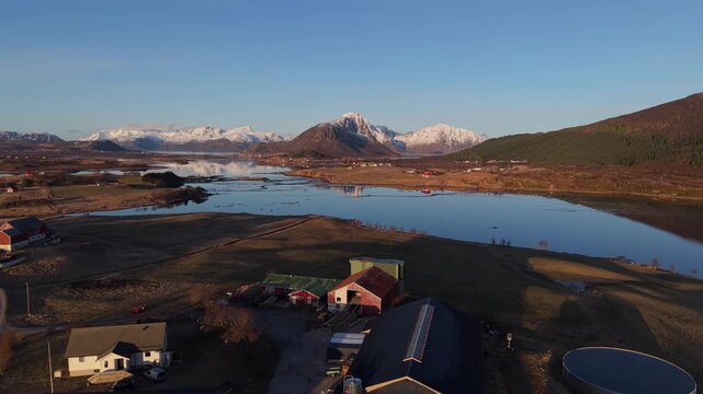 Views of a river and mountains during sunset in a rural area of Norway