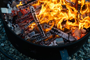 Fototapeta premium top view of fire burning for barbecue copy space