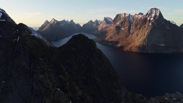 Exploration of mountains and water in a stunning landscape during sunset hours