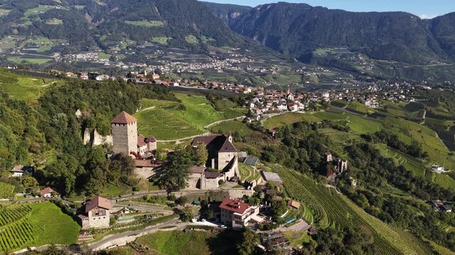 Aerial view of schenna castle and vineyards in south tyrol