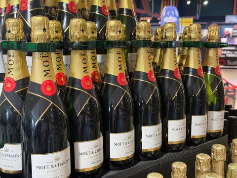 Calvia, Spain - May 05, 2026: Moet & Chandon champagne bottles arranged on display in a retail store with visible branding and packaging details