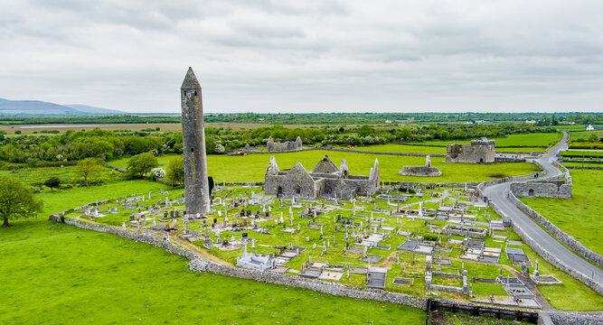 Aerial view of Kilmacduagh Abbey and cemetery near Gort, County Galway, Ireland. Historic monastic site and round tower in the Kiltartan landscape of south Galway.