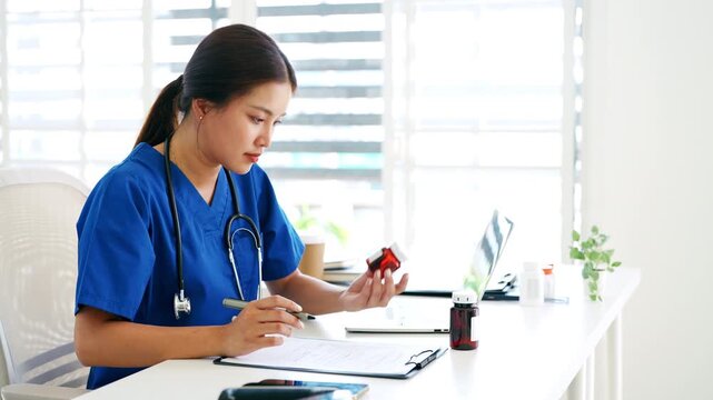 medicine, technology and healthcare concept. female doctor with clipboard working at hospital.