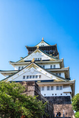 Naklejka premium view of the ornate architectural details of Osaka Castle keep, Osaka Castle Park in Chuo-ku, Osaka City, Osaka, Japan