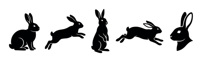 Obraz premium Five black rabbit silhouettes in various poses including sitting, jumping, and standing, creating a versatile graphic illustration for design projects.