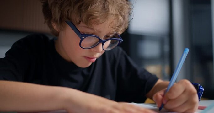 Student Checks Work. Student Thoughtfully Evaluates Responses With Concentration In Welllit Room