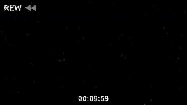 Retro VHS tape rewind effect with vintage static and digital glitches. Old video cassette player fast backward screen overlay with timecode countdown.