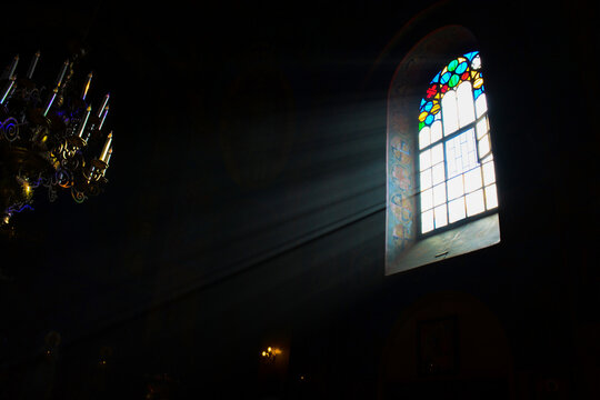 unlight in the window, interior of a Georgian tample