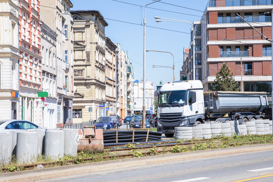 Road construction and tram track renovation on a city street in Wroclaw, Poland.
