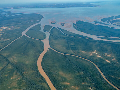 Charter flight view of a river flowing into the sea in Madagascar