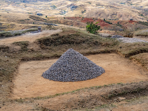 Scenery showing rock piles along the highway from Ranomafana National Park to Isalo National Park in Madagascar