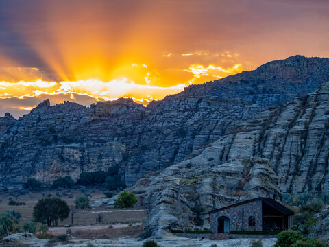 Sunset behind sandstone formations near Relais de la Reine Hotel in Isalo, Madagascar
