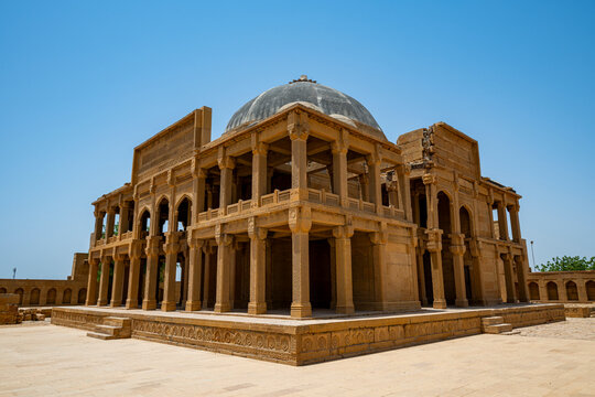 Exploring historical architecture at Makli Necropole in Pakistan with ancient graves and intricate stonework