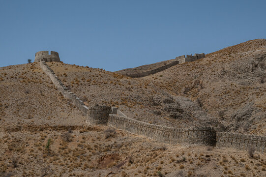 Ranikot fort displays ancient architecture on a dry landscape in Sindh, Pakistan with ruins and walls