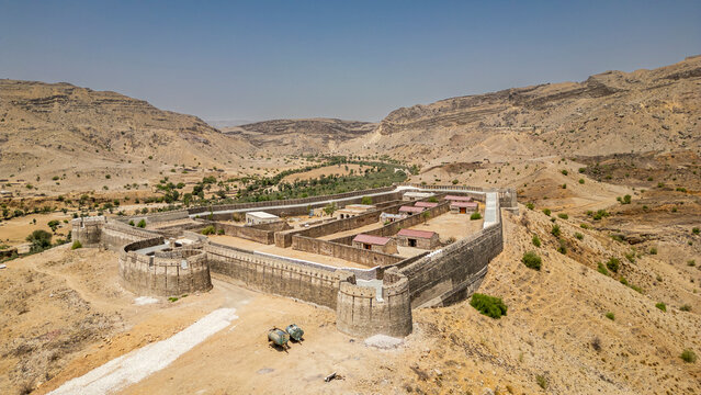 Explore the historic architecture of Ranikot Fort surrounded by barren mountains in Sindh region of Pakistan