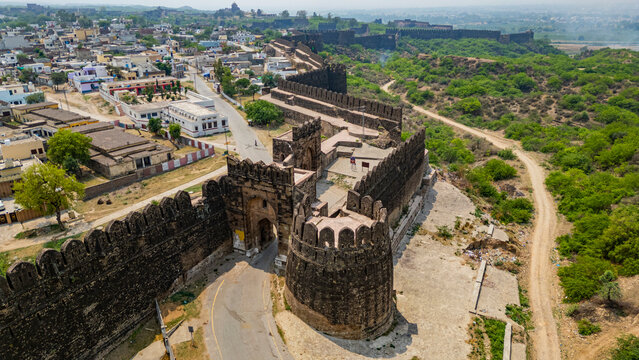 Exploring Rohtas Fort with its strong walls and ancient architecture in Punjab, Pakistan overlooking the surrounding landscape