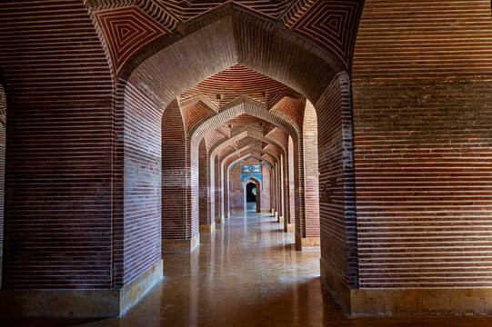 Exploration of the indoor arches of Shah Jahan Mosque in Sindh, Pakistan with intricate brickwork and patterns