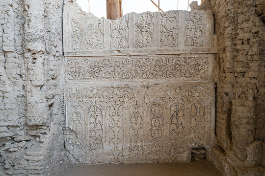 Ruins of ancient Balkh show intricate carvings that reflect its historical significance in Bactria and Buddhism in Afghanistan