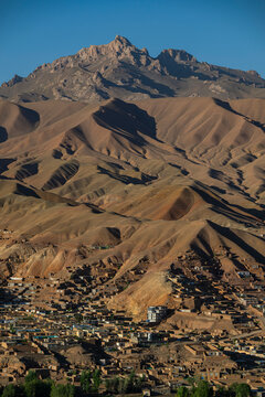 View over mountains in Bamyian from Shahr-e-Gholghola in Afghanistan near the City of Screams with clear skies
