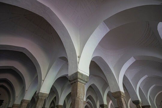 Interior view of the Sixty Dome Mosque showing arches and pillars in Bangladesh