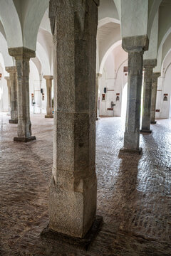 Interior view of Sixty Dome Mosque showing stone columns and arches in Bangladesh