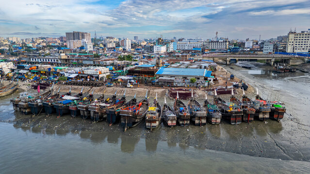 Aerial view shows fish market and boats in Chittagong, Bangladesh during daytime